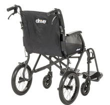 Load image into Gallery viewer, A black Drive brand folding wheelchair with a large black storage pouch on the back, shown from a three-quarter angle against a plain white background.